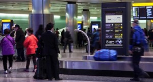 Heathrow Express and taxi comparison smart screens installed at Heathrow Terminal 2