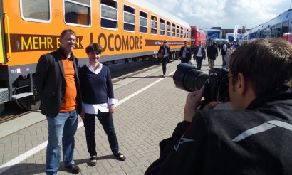 locomore-at-innotrans%3b-derek-ladewig-and-katrin-seiler-being-photographed-lr