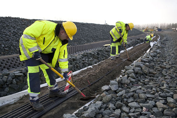 Rail workers actively work on the 6.5km-long railway bed between Bundel-Zuid and the existing Beveren rail tunnel