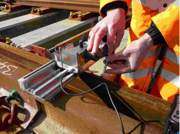 Figure 5 MiniProf (including a switch and crossing baseplate) collecting rail profiles from a switch blade in a manufacturer’s yard