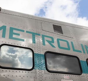 Metrolink logo on the side of a locomotive