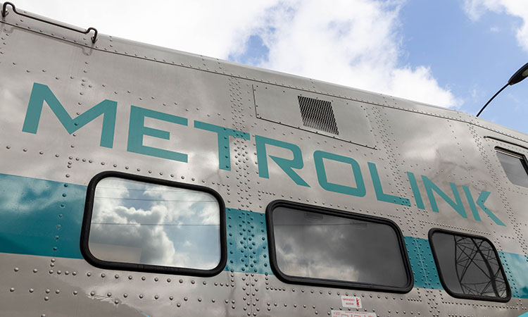 Metrolink logo on the side of a locomotive