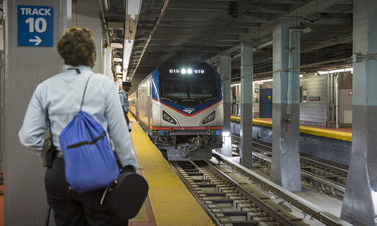 Passengers waiting for an Amtrak train in New York