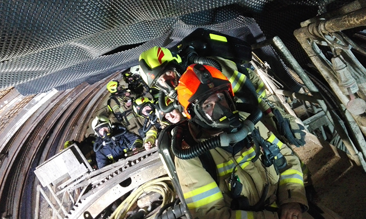 A fire brigade training exercise on the TBM with respirators