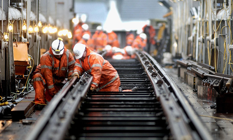 Network Rail employees working on a rail line.