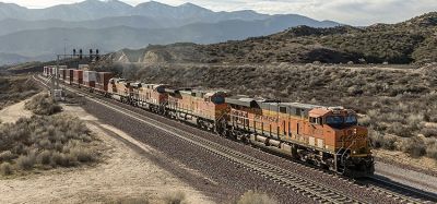 A train passing the mountains