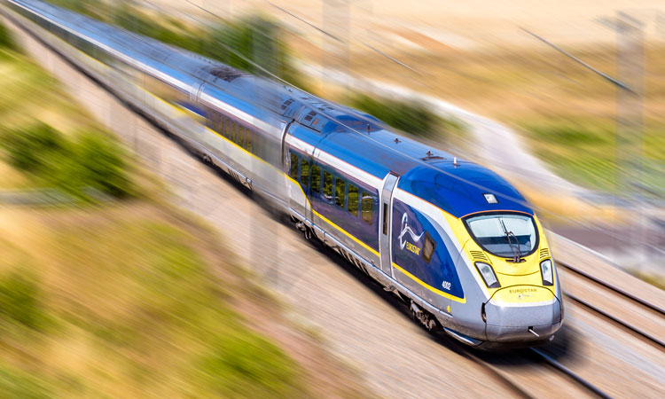 Eurostar train travelling on tracks at high-speed