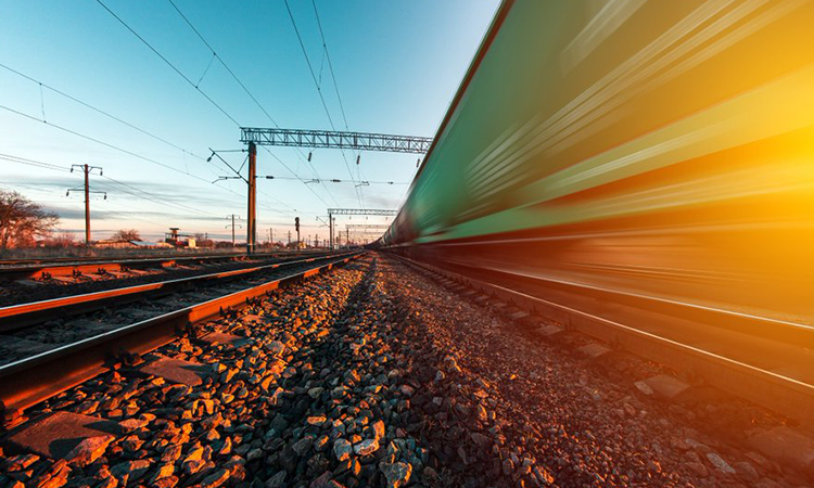 Image of train travelling through Australia with motion blur.