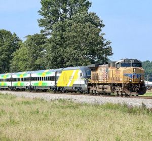 A moving Brightline locomotive.