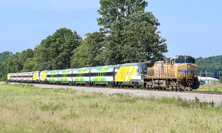 A moving Brightline locomotive.