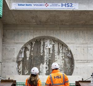 HS2 workers stood in front of the new tunnel