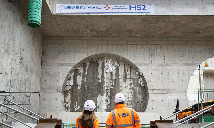 HS2 workers stood in front of the new tunnel