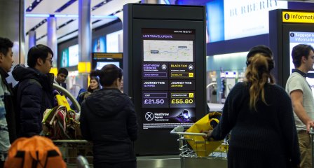 Heathrow Express and taxi comparison smart screens installed at Heathrow Terminal 2