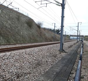 Track underneath an overcast sky