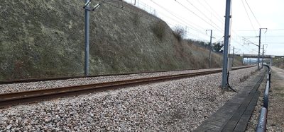 Track underneath an overcast sky