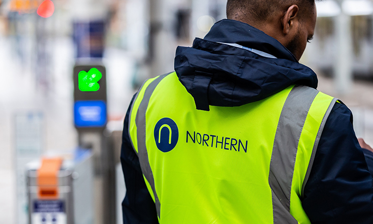 Northern staff member at ticket gate line