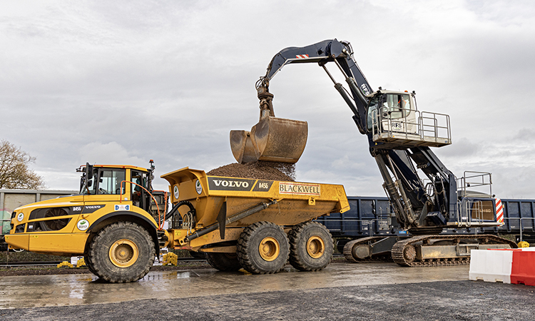 Loading aggregate from the first train at Quainton railhead