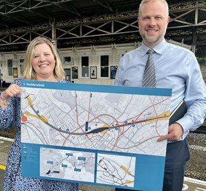 Neil Holm (right), Transpennine Route Upgrade Director, with Hannah Lomas (left), Principal Programme Sponsor, at Huddersfield station
