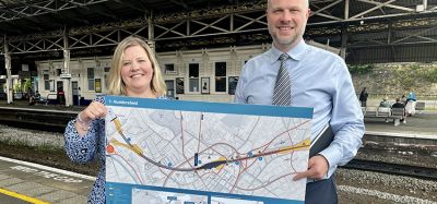 Neil Holm (right), Transpennine Route Upgrade Director, with Hannah Lomas (left), Principal Programme Sponsor, at Huddersfield station