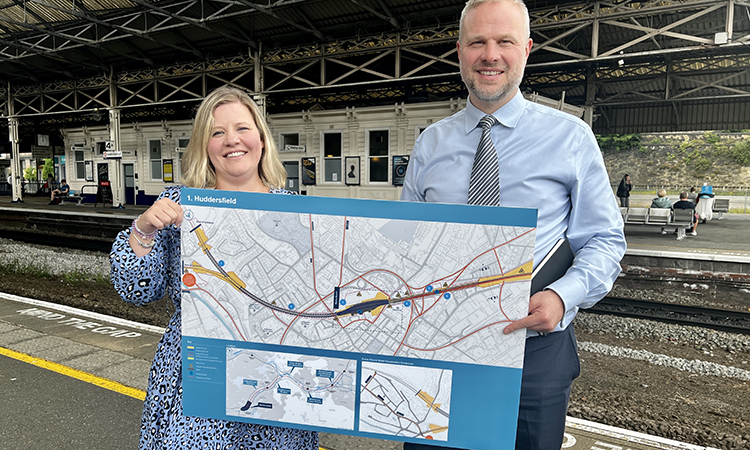 Neil Holm (right), Transpennine Route Upgrade Director, with Hannah Lomas (left), Principal Programme Sponsor, at Huddersfield station