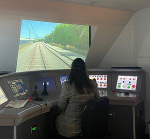 Nusrat Ghani MP driving a train simulator