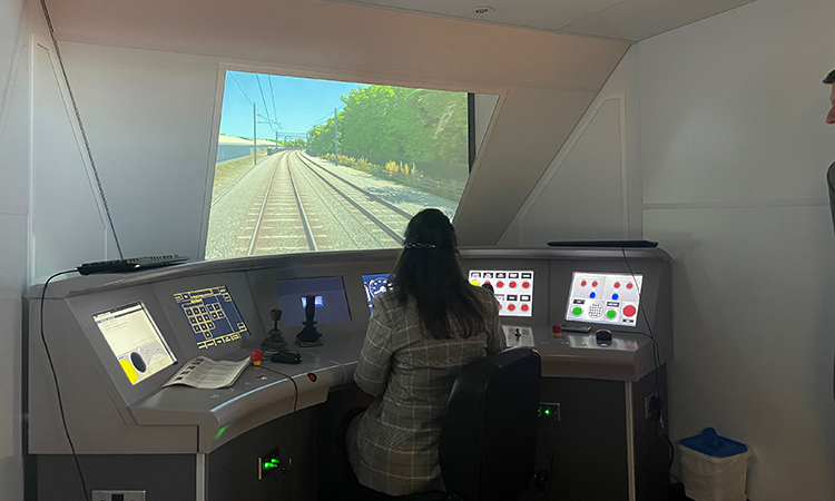 Nusrat Ghani MP driving a train simulator