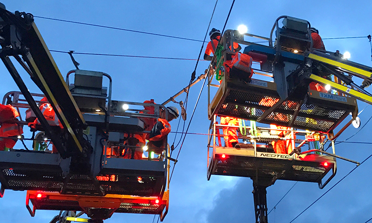 A Network Rail crew seek to repair a line