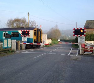 Open level crossing barrier programme complete