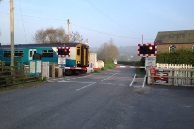 Open level crossing barrier programme complete