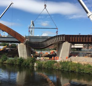 Twin steel bands for the Ordsall Chord are lifted into place