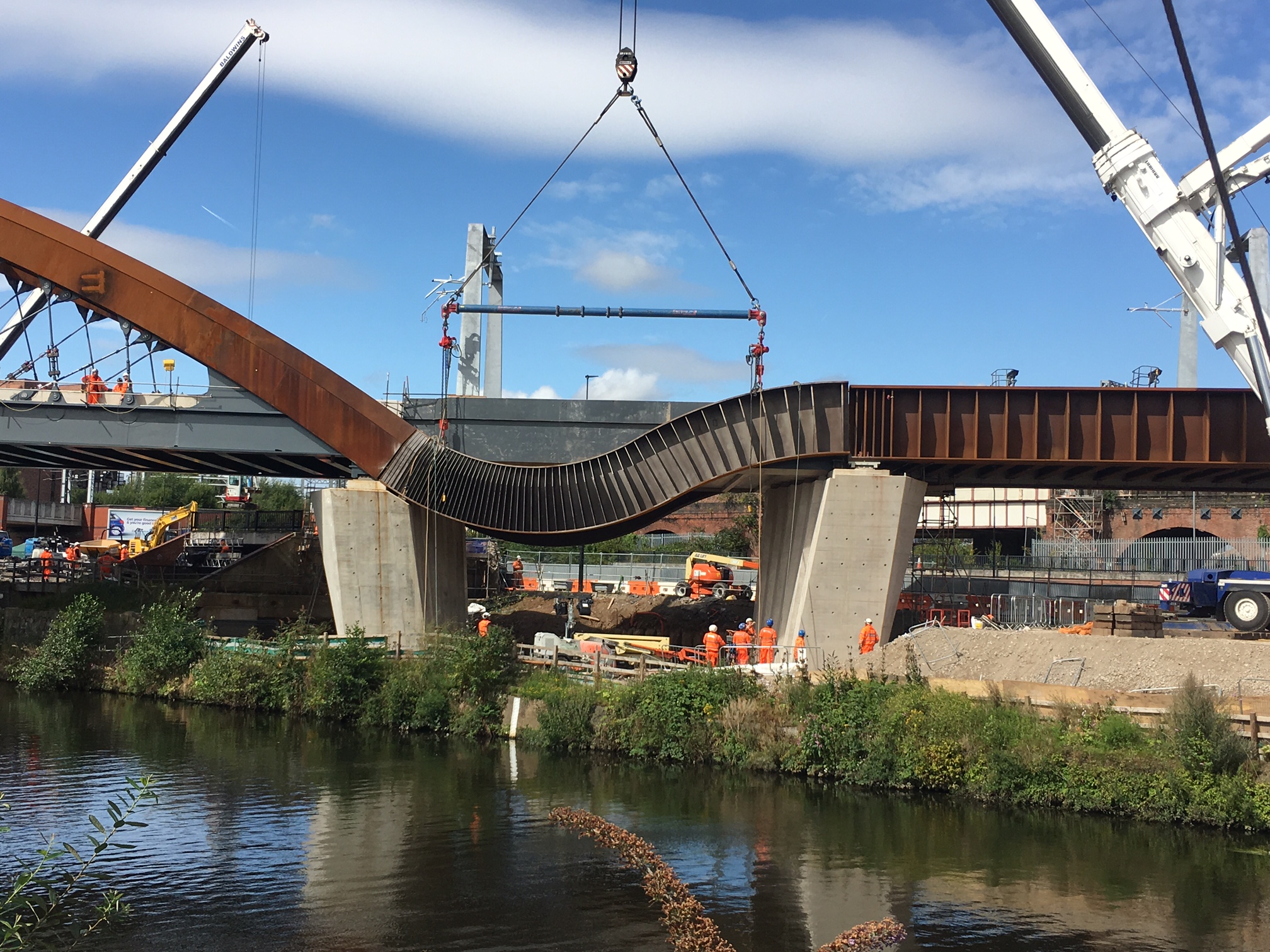 Twin steel bands for the Ordsall Chord are lifted into place