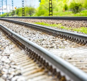 Railroad track rails in country land space