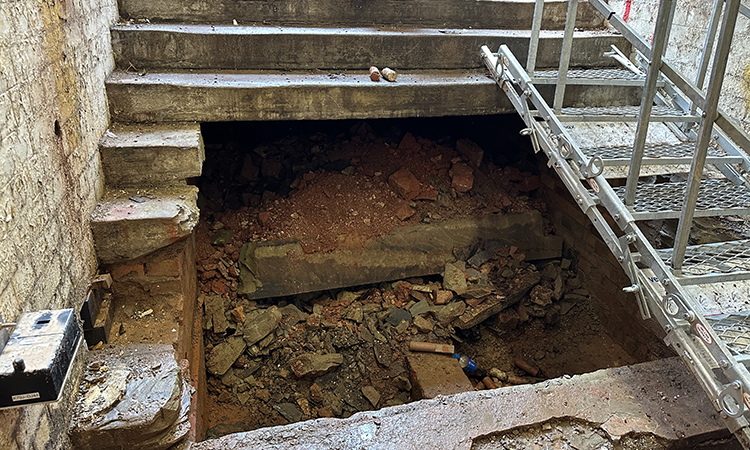 The unexpected foundations found after demolition of concrete subway steps at Warwick station