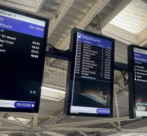 This image shows the new full colour screens being installed across Northern stations