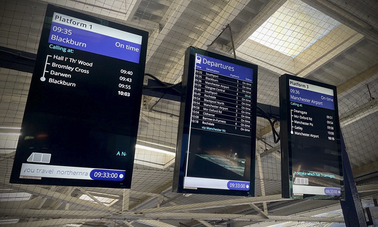 This image shows the new full colour screens being installed across Northern stations