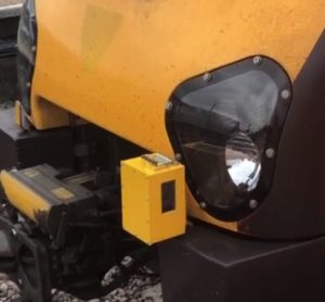 A camera on the front of a train that is used to monitor the surrounding biodiversity