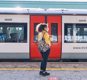 Passenger waiting at a platform to enter a train