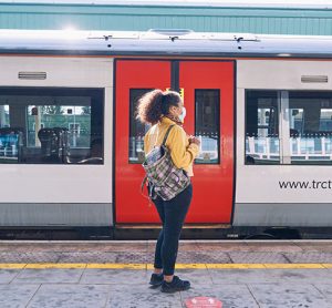 Passenger waiting at a platform to enter a train