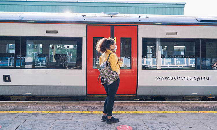 Passenger waiting at a platform to enter a train
