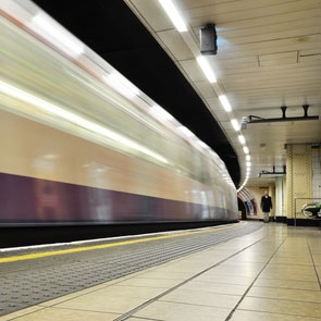 Tube train pulling out of station