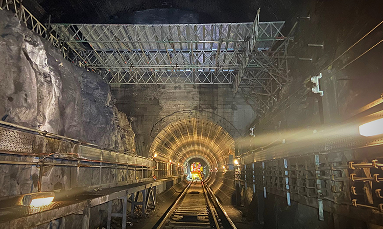 View down the tunnel towards Brunswick station with scaffold deck under construction above