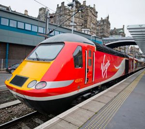 Virgin Trains East Coast will receive a £21 million overhaul of its 45 high speed diesel trains as part of a £40 million commitment to improve its fleet since launching the east coast franchise in March 2015. The programme is part of a package to invest £140 million over eight years. The £21 million investment will be spent on the complete refurbishment of the train’s interiors. A total of 401 carriages will be overhauled with 24,123 seats replaced along with refurbished toilets, new carpets and curtains. Leather seats will be fitted in First Class. Upgrade work will be carried out at Virgin Trains Bounds Green depot in London and its Craigentinny depot in Edinburgh, where it will also fit 35 new engines to its diesel high speed train fleet as part of a £16 million contract with engine manufacturer MTU. External work will also be carried out on the trains taking the investment to more than £40 million. David Horne, Managing Director of Virgin Trains on the east coast route, said: “Since Virgin started running this railway, the bar has been raised by customers who rightly demand a high quality customer experience, something which they would expect from a Virgin business, as well as getting great value for money. “And that’s exactly what we’ve been working hard to deliver, with this multi million investment in our trains not only one of the biggest investments of its kind ever seen on the east coast route, but also three years ahead of the introduction of new Super Express Trains as part of the Government’s InterCity Express programme. “We’re investing now so our customers can benefit from new seats and a great new on-board environment before we get a new fleet of 65 trains from 2018.” The first refurbished train will enter service on 14 December 2015 coinciding with the launch of Virgin Train new service between Sunderland and London. Trains East Coast to receive 21 million pound refurbishment