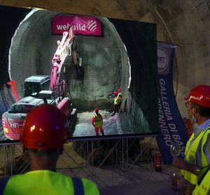 Webuild workers witness the completion of tunnel work under Brenner.