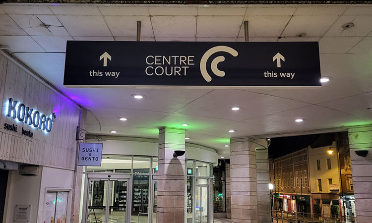 A new sign intending to make wayfinding easier for passengers at Wimbledon station