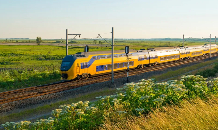 An electric train in the summer