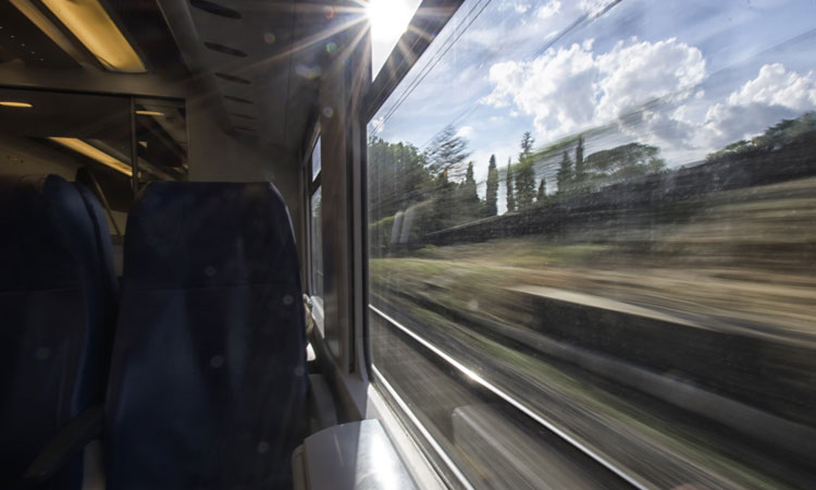 A high-speed train with track view from the window