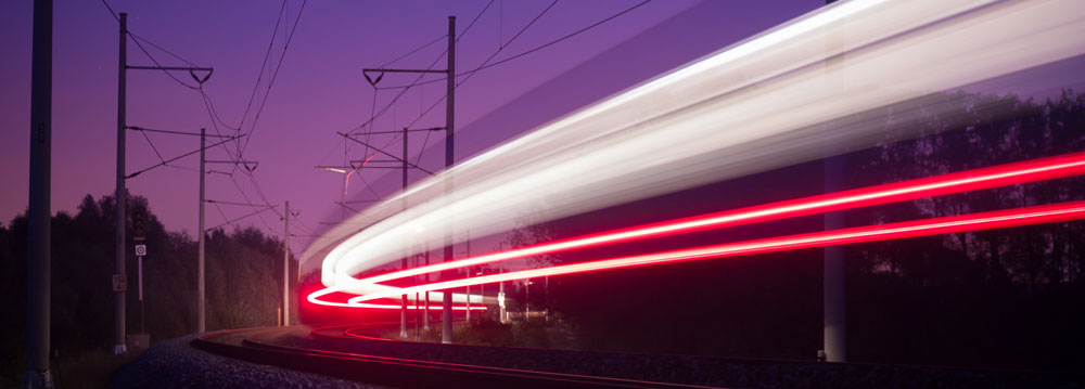 Lights from a speeding train at night