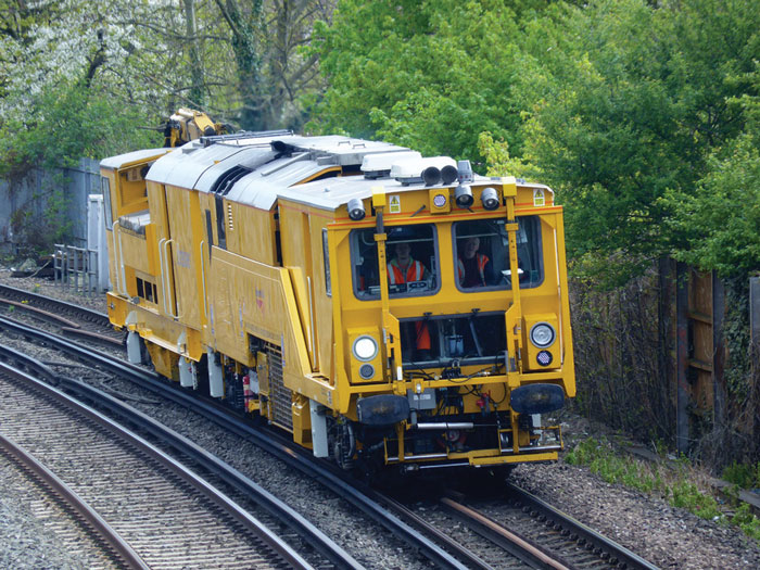 A stoneblower operating on UK tracks