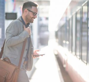 Rail passenger boarding a train