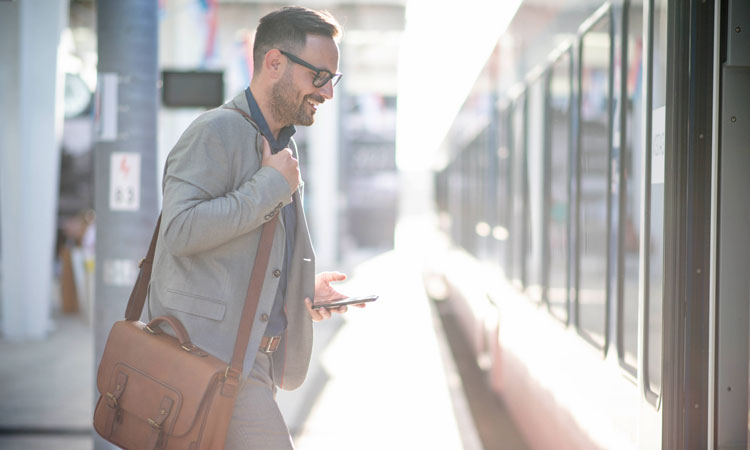 Rail passenger boarding a train